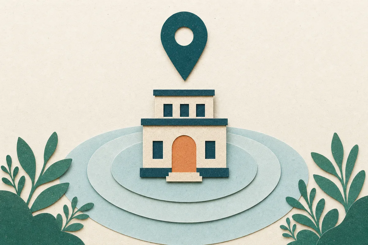 Paper-cut illustration of a teal map pin above an office building shape beside a soft arched doorway, with mist-blue waves suggesting a service area